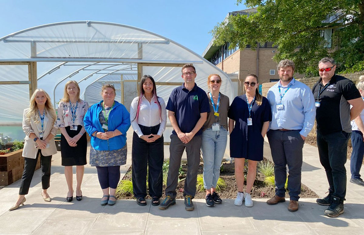 Partnership representatives at green therapy project.